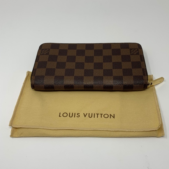 Louis Vuitton Handbags - 100% Auth Louis Vuitton Brown Zippy Damier Wallet